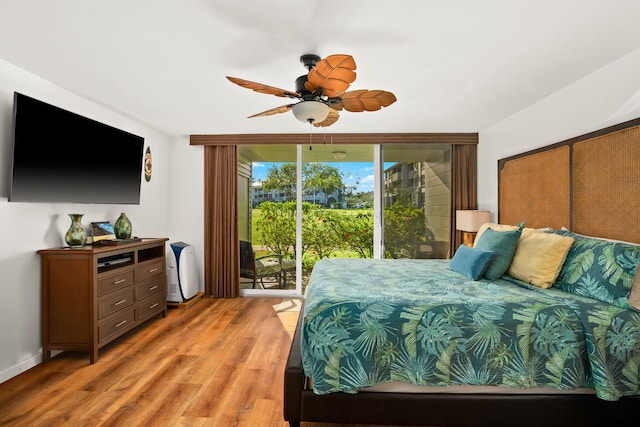 3811 Edward Rd Unit 8204, Princeville, HI 96722 - bedroom featuring access to exterior, light wood-style floors, and ceiling fan
