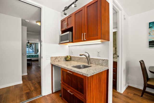 3811 Edward Rd Unit 8204, Princeville, HI 96722 - kitchen with a sink, dark wood finished floors, light stone countertops, and baseboards