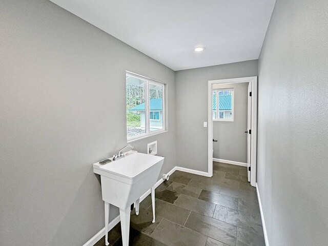 11-3782-A Nahelenani St, Volcano, HI 96785 - laundry room with washer hookup, baseboards, dark stone finish flooring, and recessed lighting