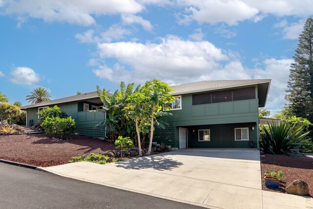 68-3744 Ua Noe Pl, Waikoloa, HI 96738 - view of front of house featuring concrete driveway and a carport