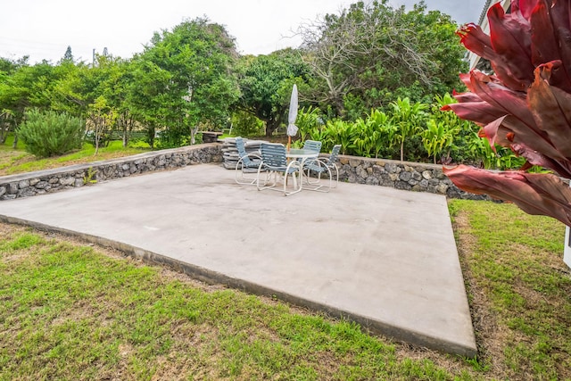 94-6661 Kamaoa Rd, Naalehu, HI 96772 - view of patio / terrace featuring outdoor dining area