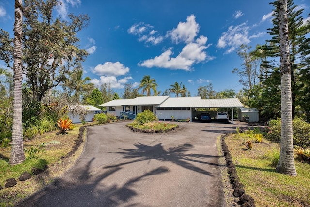 15-1429 23rd Ave, Keaau, HI 96749 - ranch-style home with driveway and an attached carport