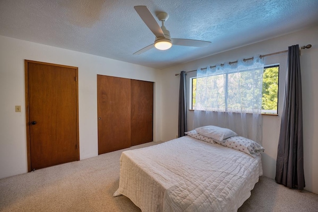15-1429 23rd Ave, Keaau, HI 96749 - bedroom with carpet flooring, a textured ceiling, and a ceiling fan