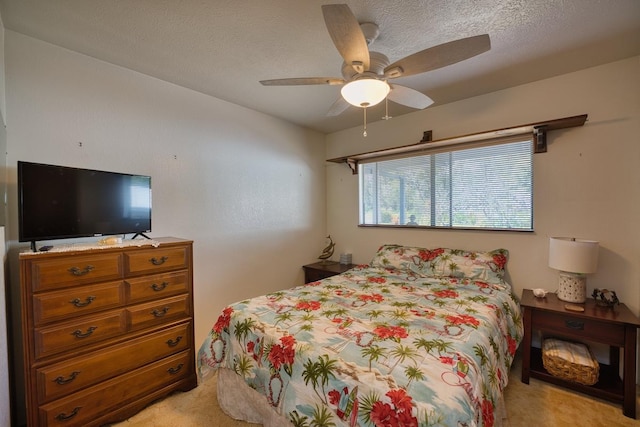 15-1429 23rd Ave, Keaau, HI 96749 - bedroom with light colored carpet, a ceiling fan, and a textured ceiling