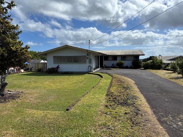 273 Iwalani St, Hilo, HI 96720 - ranch-style home featuring a front lawn and asphalt driveway