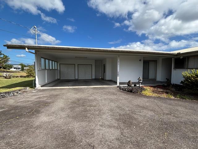 273 Iwalani St, Hilo, HI 96720 - view of front of house with driveway and an attached garage