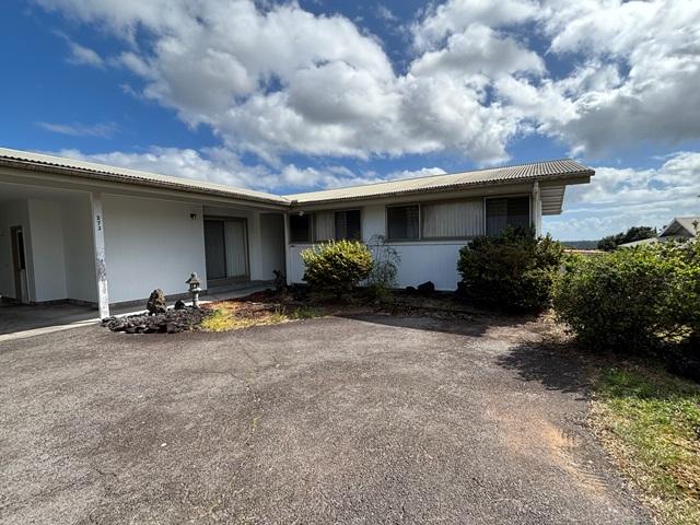273 Iwalani St, Hilo, HI 96720 - view of front facade featuring asphalt driveway