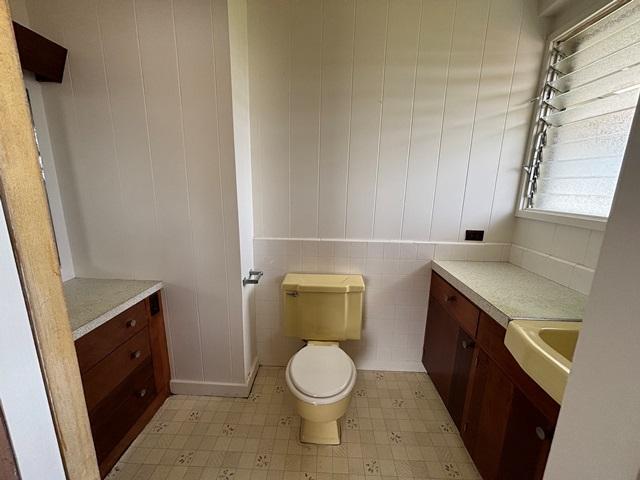 273 Iwalani St, Hilo, HI 96720 - bathroom with toilet, vanity, and tile patterned floors