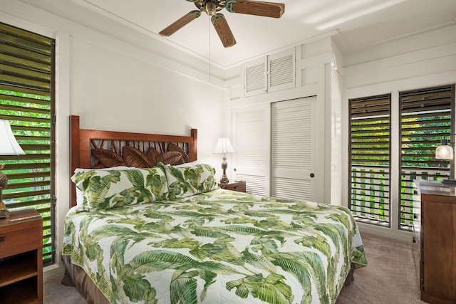 2253 Poipu Rd Unit 55, Koloa, HI 96756 - bedroom featuring carpet flooring, multiple windows, and ceiling fan