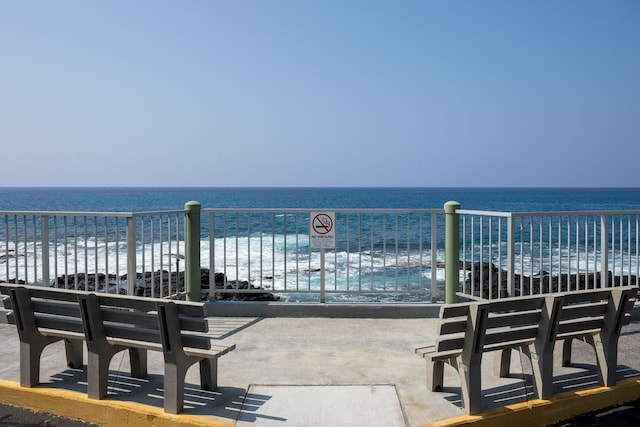 75-6016 Alii Dr Unit 113, Kailua-Kona, HI 96740 - view of patio featuring view of water and beach