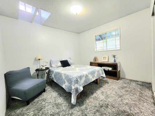 13-1128 Malama St, Pahoa, HI 96778 - bedroom with carpet floors and a skylight
