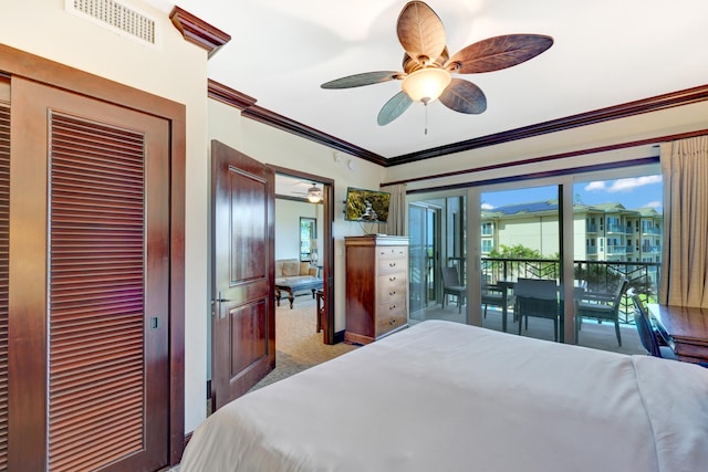 4-820 Kuhio Hwy Unit H304, Kapaa, HI 96746 - bedroom featuring carpet floors, ornamental molding, a closet, a ceiling fan, and access to outside
