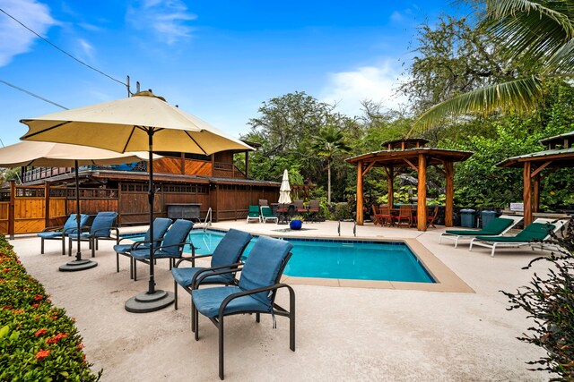 78-6665 Alii Dr Unit 302, Kailua-Kona, HI 96740 - view of pool featuring a gazebo and a patio