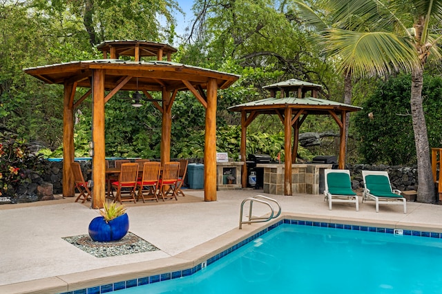 78-6665 Alii Dr Unit 302, Kailua-Kona, HI 96740 - outdoor pool with a gazebo, a patio, and view of scattered trees