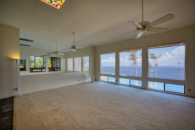 36-2335 Old Mamalahoa Hwy, Laupahoehoe, HI 96764 - carpeted spare room with ceiling fan and baseboards