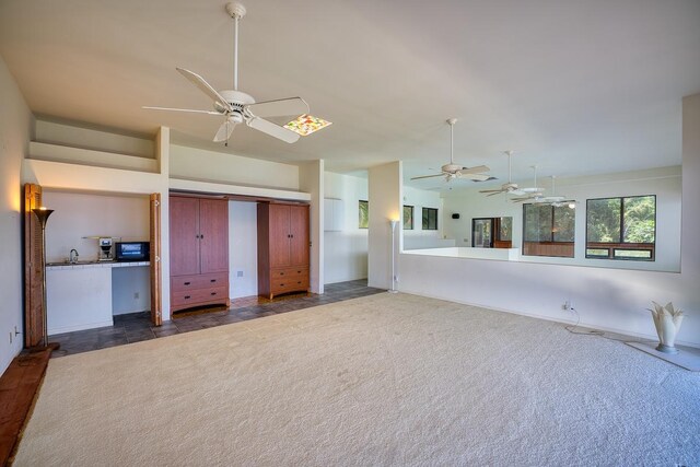 36-2335 Old Mamalahoa Hwy, Laupahoehoe, HI 96764 - unfurnished living room featuring ceiling fan and dark colored carpet
