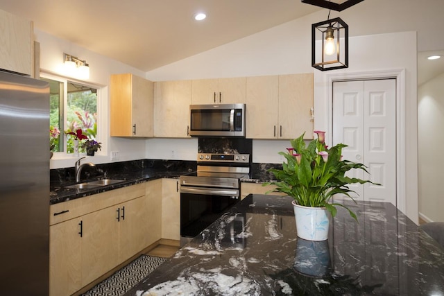 15-1798 20th Ave, Keaau, HI 96749 - kitchen featuring stainless steel appliances, light brown cabinetry, dark stone counters, lofted ceiling, and recessed lighting