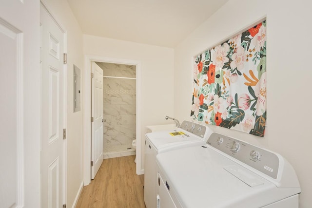 15-1798 20th Ave, Keaau, HI 96749 - laundry room with washer and dryer, light wood-style floors, electric panel, and a sink