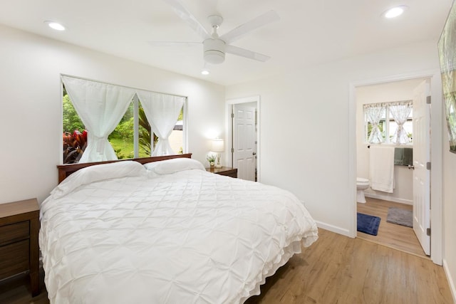 15-1798 20th Ave, Keaau, HI 96749 - bedroom featuring light wood-style floors, recessed lighting, baseboards, ensuite bathroom, and ceiling fan
