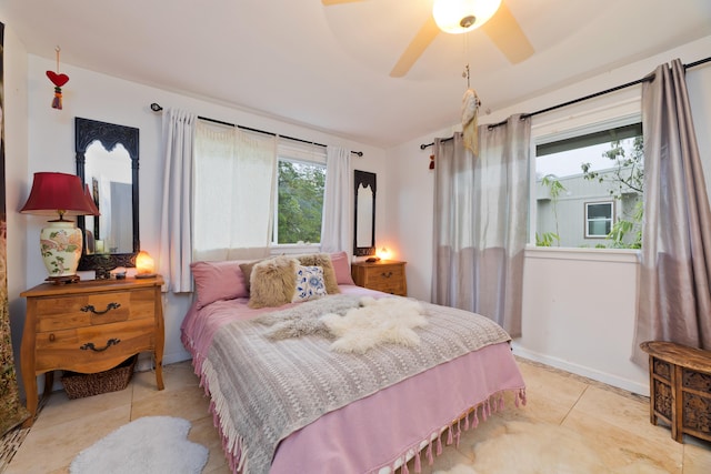 15-1565 Beach Rd, Keaau, HI 96749 - bedroom with light tile patterned floors and a ceiling fan
