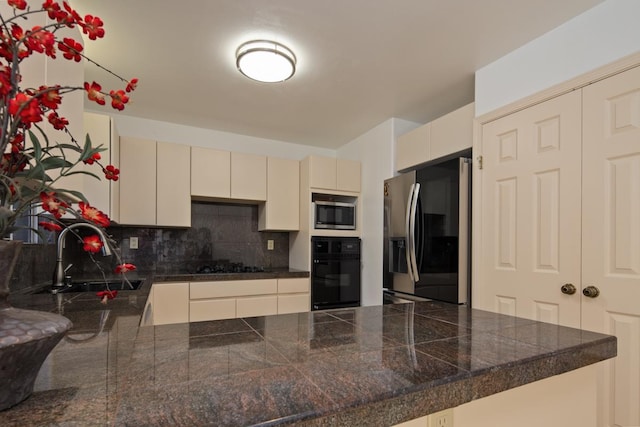 68-1842 Auhili Loop, Waikoloa, HI 96738 - kitchen featuring tile counters, appliances with stainless steel finishes, a sink, a peninsula, and backsplash
