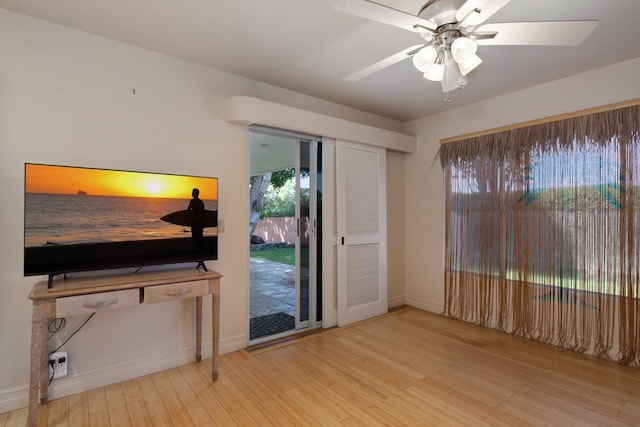 68-1842 Auhili Loop, Waikoloa, HI 96738 - living area with wood finished floors, a ceiling fan, and baseboards
