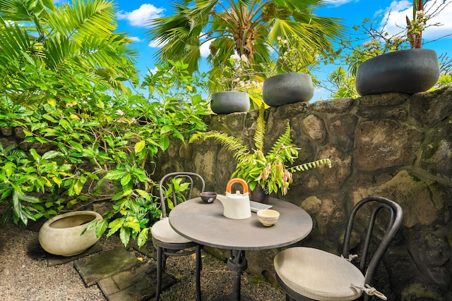 4100 Queen Emmas Dr Unit 64, Princeville, HI 96722 - view of patio / terrace