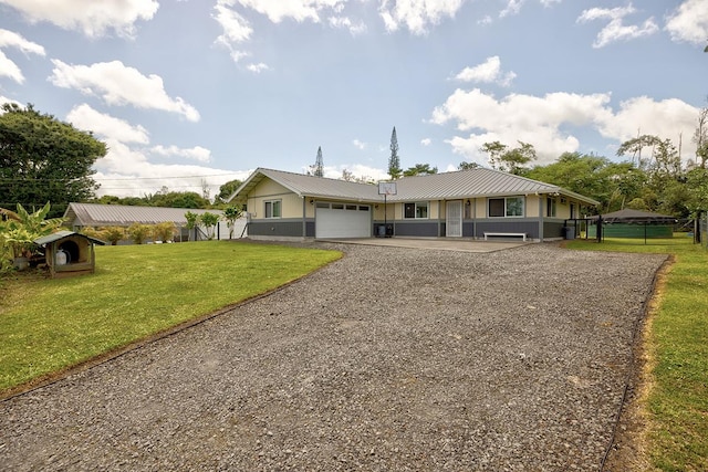 15-1888 22nd Ave, Keaau, HI 96749 - ranch-style house featuring a garage, driveway, and metal roof