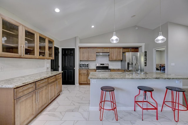15-1888 22nd Ave, Keaau, HI 96749 - kitchen featuring stainless steel appliances, a sink, light marble finish floors, under cabinet range hood, and vaulted ceiling
