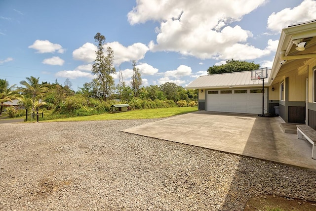 15-1888 22nd Ave, Keaau, HI 96749 - view of yard with concrete driveway and an attached garage