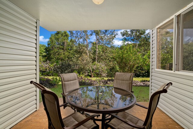 3811 Edward Rd Unit 1108, Princeville, HI 96722 - view of patio featuring outdoor dining area