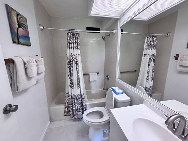 3811 Edward Rd Unit 1108, Princeville, HI 96722 - full bathroom with shower / bath combination with curtain, vanity, tile patterned floors, and toilet