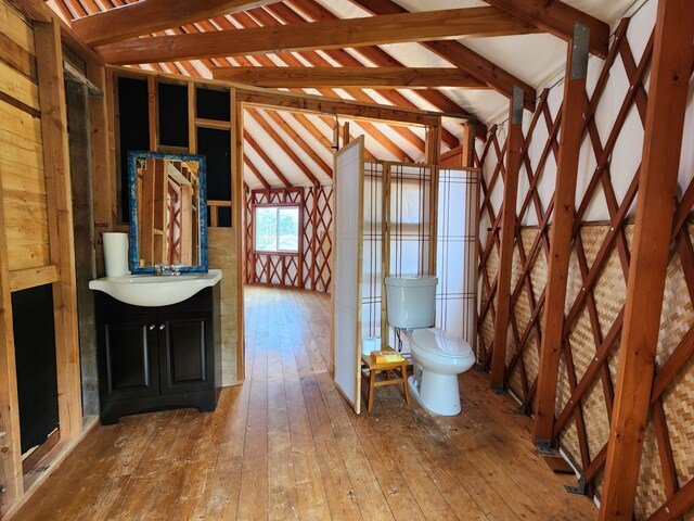 15-2064 26th Ave, Keaau, HI 96749 - bathroom with toilet, hardwood / wood-style floors, vanity, and lofted ceiling