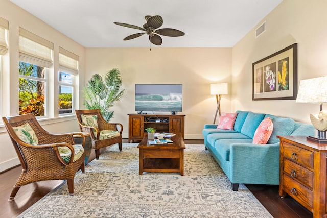 2611 Kiahuna Plantation Dr Unit 15F, Koloa, HI 96756 - living room with wood finished floors, ceiling fan, and baseboards