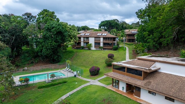 4701 Kawaihau Rd Unit A101, Kapaa, HI 96746 - back of house with a deck, stucco siding, and a sunroom