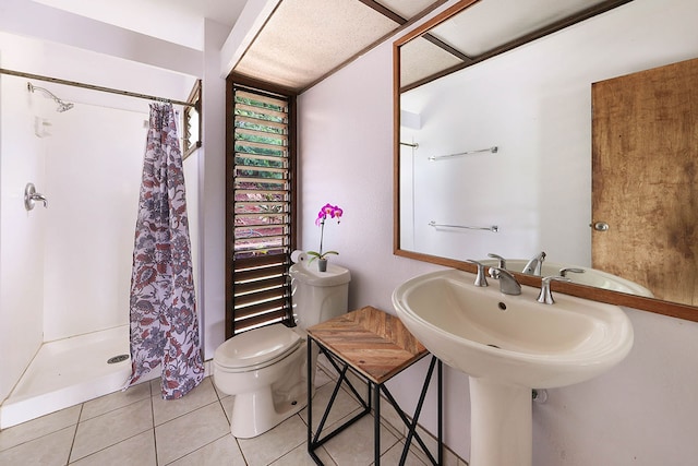 4701 Kawaihau Rd Unit A101, Kapaa, HI 96746 - full bath with toilet, a shower stall, and tile patterned floors