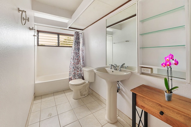 4701 Kawaihau Rd Unit A101, Kapaa, HI 96746 - full bath with tile patterned flooring, toilet, shower / tub combo, baseboards, and a sink