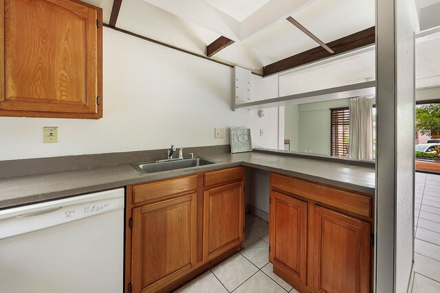 4701 Kawaihau Rd Unit A101, Kapaa, HI 96746 - kitchen with white dishwasher, a sink, light tile patterned floors, and brown cabinetry