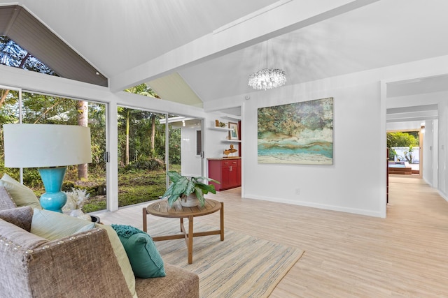 15-2774 Ahi St, Pahoa, HI 96778 - living area with light wood finished floors, baseboards, and a chandelier