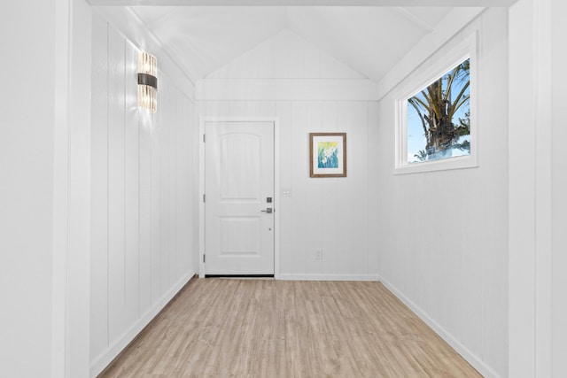15-2774 Ahi St, Pahoa, HI 96778 - interior space featuring light wood-type flooring, vaulted ceiling, and baseboards