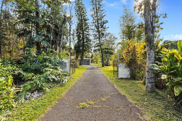 15-2774 Ahi St, Pahoa, HI 96778 - view of asphalt driveway featuring a gated entry