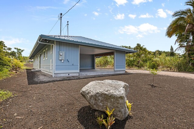 16-2050 Pikake Dr, Pahoa, HI 96778 - back of property featuring a metal roof