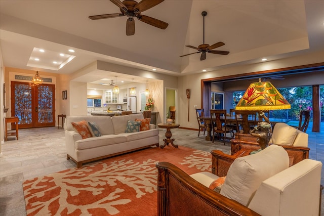 75-665 Kula Kai Pl, Kailua-Kona, HI 96740 - living room with ceiling fan, recessed lighting, a tray ceiling, and high vaulted ceiling