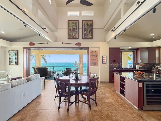 75-5952 Alii Dr, Kailua-Kona, HI 96740 - dining room featuring wine cooler, healthy amount of natural light, ceiling fan, track lighting, and recessed lighting