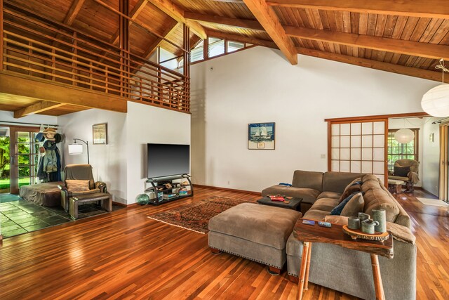 6161 Holio Rd, Kapaa, HI 96746 - living area with high vaulted ceiling, french doors, hardwood / wood-style floors, wooden ceiling with exposed beams, and healthy amount of natural light