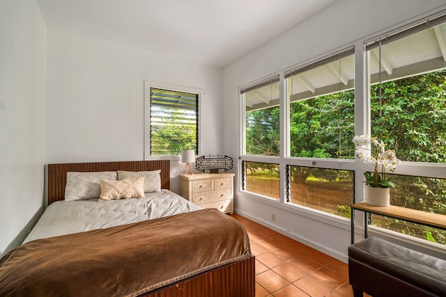 6161 Holio Rd, Kapaa, HI 96746 - bedroom featuring light tile patterned flooring and baseboards