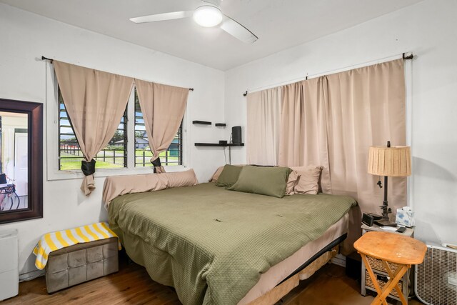 6161 Holio Rd, Kapaa, HI 96746 - bedroom with wood finished floors and a ceiling fan