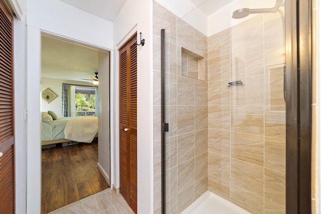 16-1381 Pohaku Cir, Keaau, HI 96749 - ensuite bathroom featuring a stall shower, a closet, and a ceiling fan