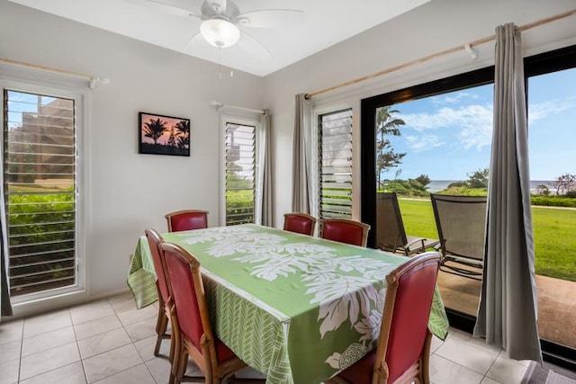 4460 Nehe Rd Unit 118, Lihue, HI 96766 - dining room featuring light tile patterned floors, healthy amount of natural light, and a ceiling fan