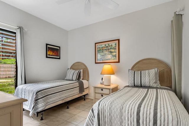 4460 Nehe Rd Unit 118, Lihue, HI 96766 - bedroom featuring a ceiling fan and light tile patterned floors